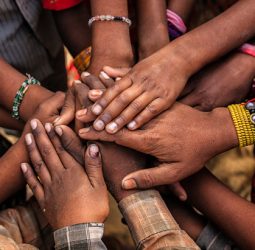 Children's hands in one of Indian villages showing unity.